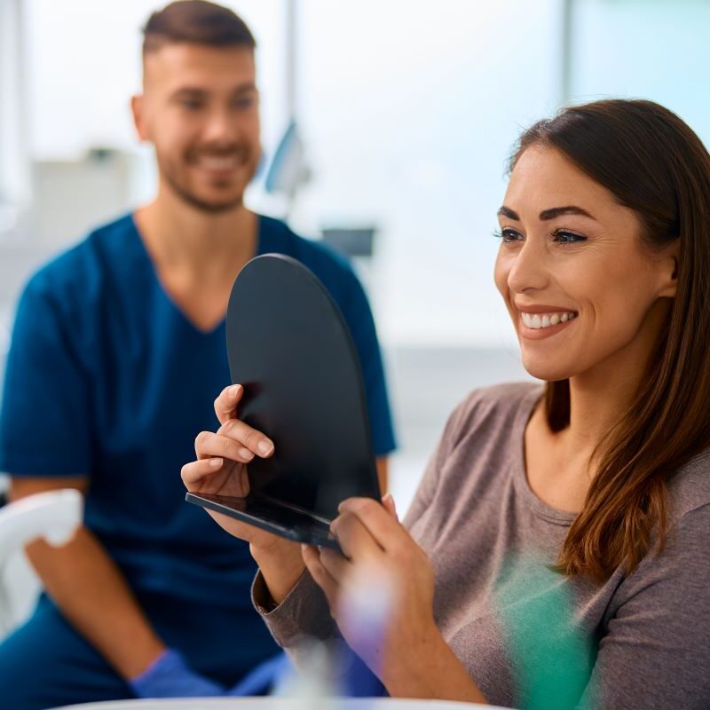 Patient smiling after oral exam in Rocklin, California